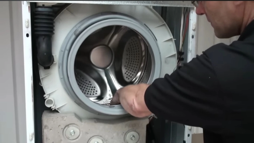 Technician diagnosing a washer that will not spin in a Colorado Springs home